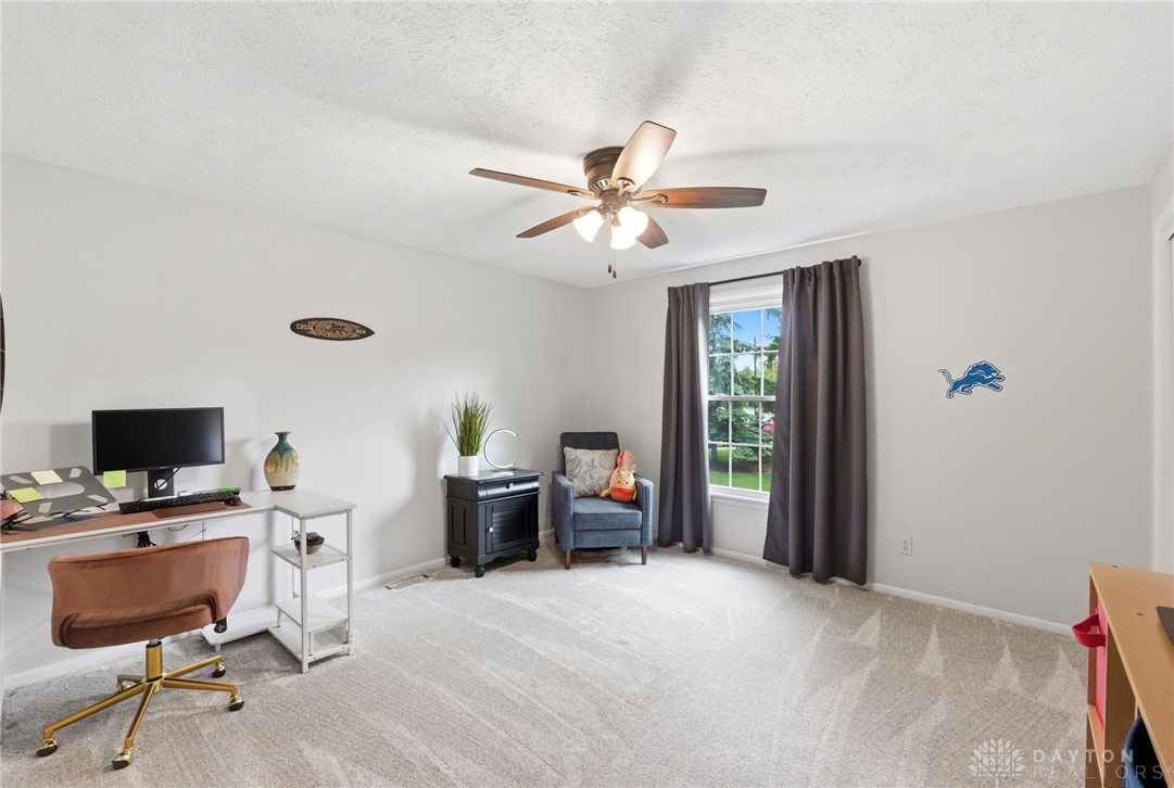 8916 Paragon Road Dayton, OH 45458 - Photo 18 of 33 This bright room features a comfortable atmosphere, ideal for productivity or relaxation.