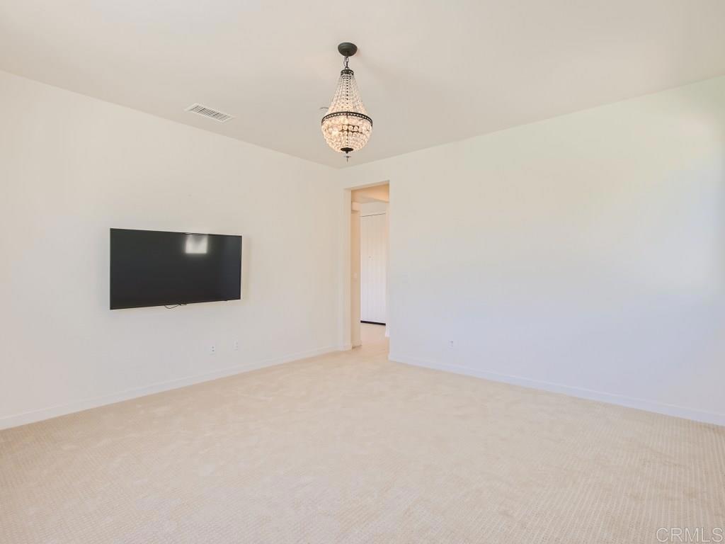 31657 Calle De Las Estrellas Bonsall, CA 92003 - Photo 22 of 24 a view of an empty room with a window