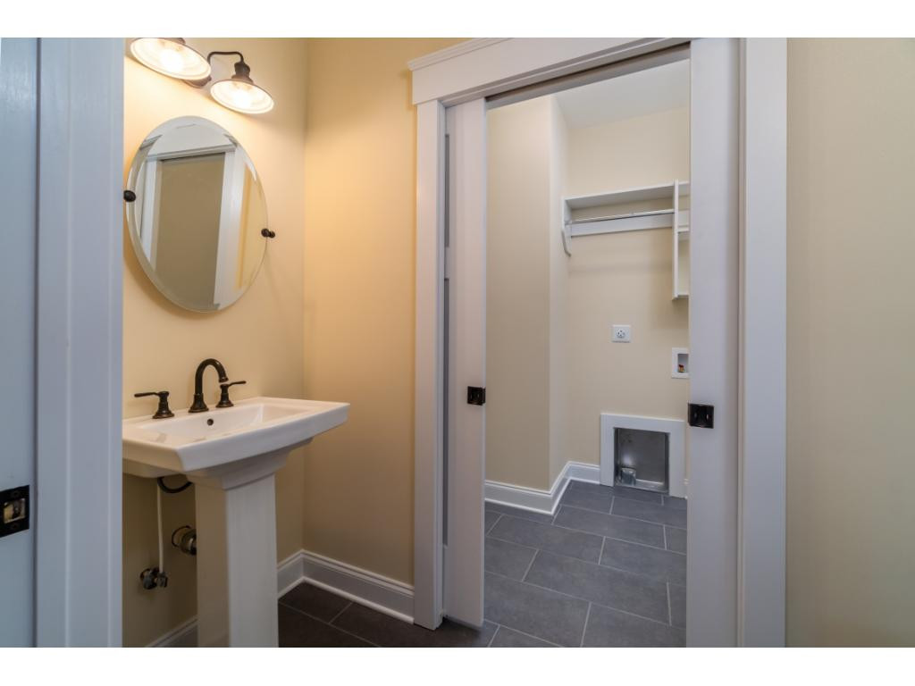 876 Pleasant Valley Road Jonesborough, TN 37659 - Photo 13 of 26 Half BathroomLaundry Room