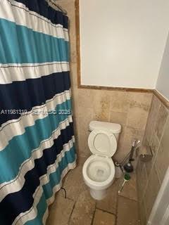9225 Southwest 87th Avenue, Unit A6 Miami, FL 33176 - Photo 13 of 16 a bathroom with a toilet and a sink