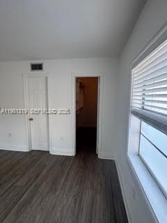 9225 Southwest 87th Avenue, Unit A6 Miami, FL 33176 - Photo 14 of 16 a view of empty room with wooden floor