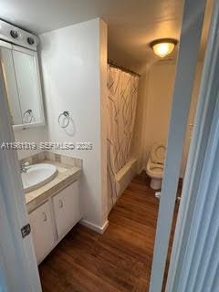 9225 Southwest 87th Avenue, Unit A6 Miami, FL 33176 - Photo 3 of 16 a bathroom with a granite countertop sink toilet and shower