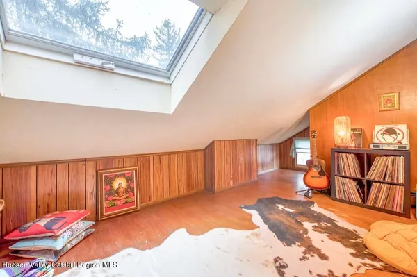 a view of a bedroom with a window