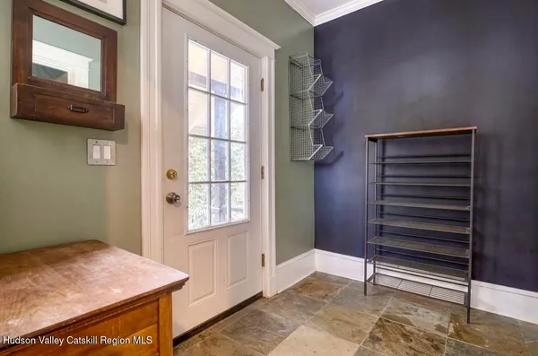 a view of an entryway with a window