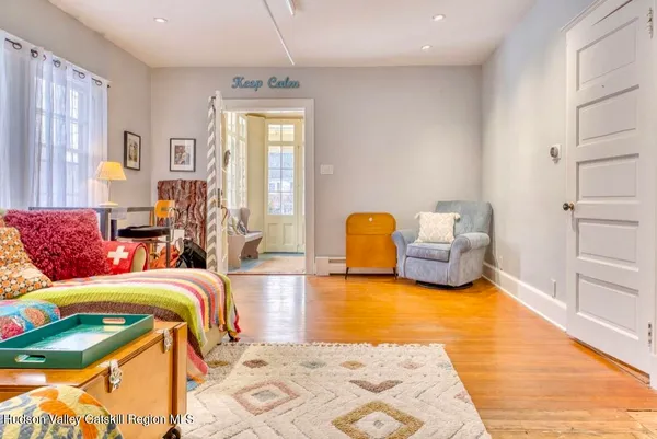 a living room with furniture and a table