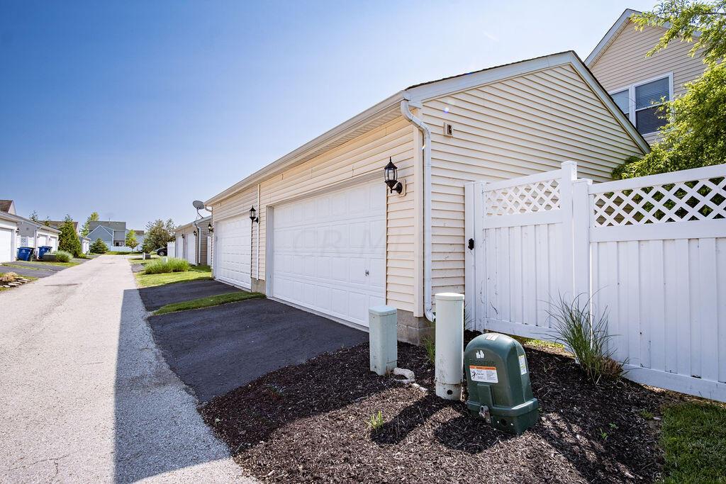 6051 Hayden Farms Road Dublin, OH 43016 - Photo 29 of 34 Garage Alley View