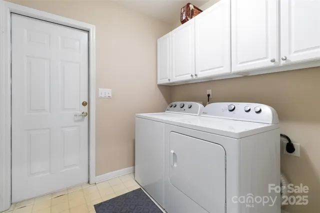 a front view of a house with a large window