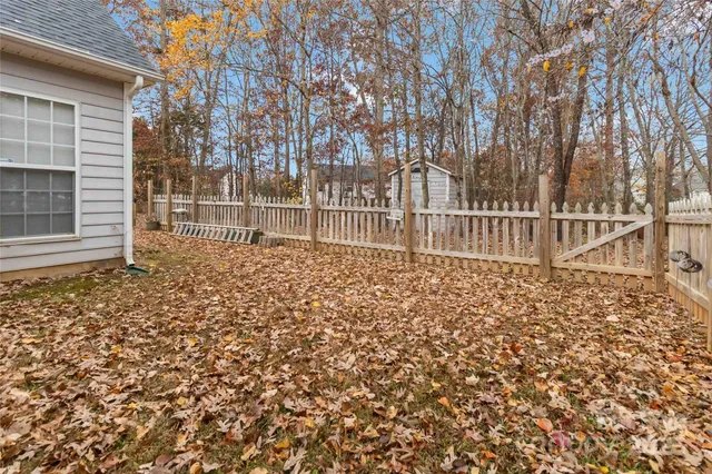 swimming pool view with a seating space