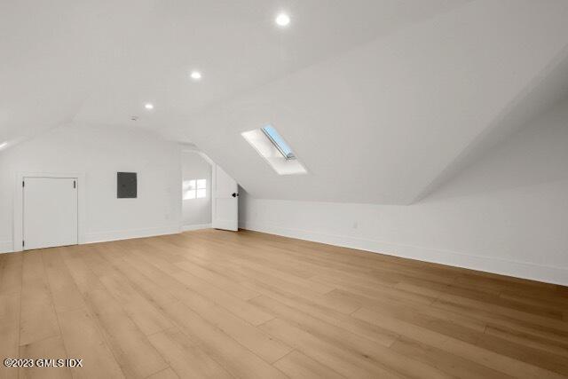 204 Sheep Hill Road Riverside, CT 06878 - Photo 44 of 62 an empty room with wooden floor and windows