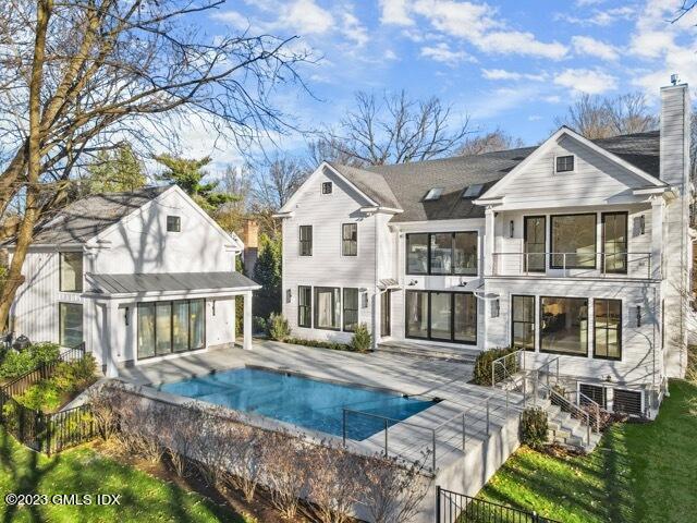 204 Sheep Hill Road Riverside, CT 06878 - Photo 53 of 62 a front view of a house with a yard