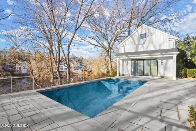 204 Sheep Hill Road Riverside, CT 06878 - Photo 56 of 62 a view of a house with backyard and tree