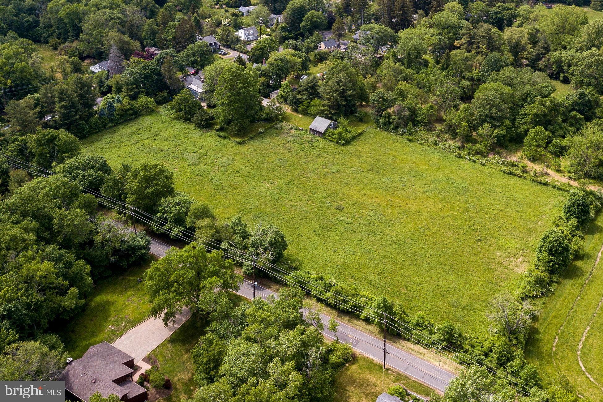146 Carter Road Princeton, NJ 08540 - Photo 2 of 39 an aerial view of a residential houses with outdoor space