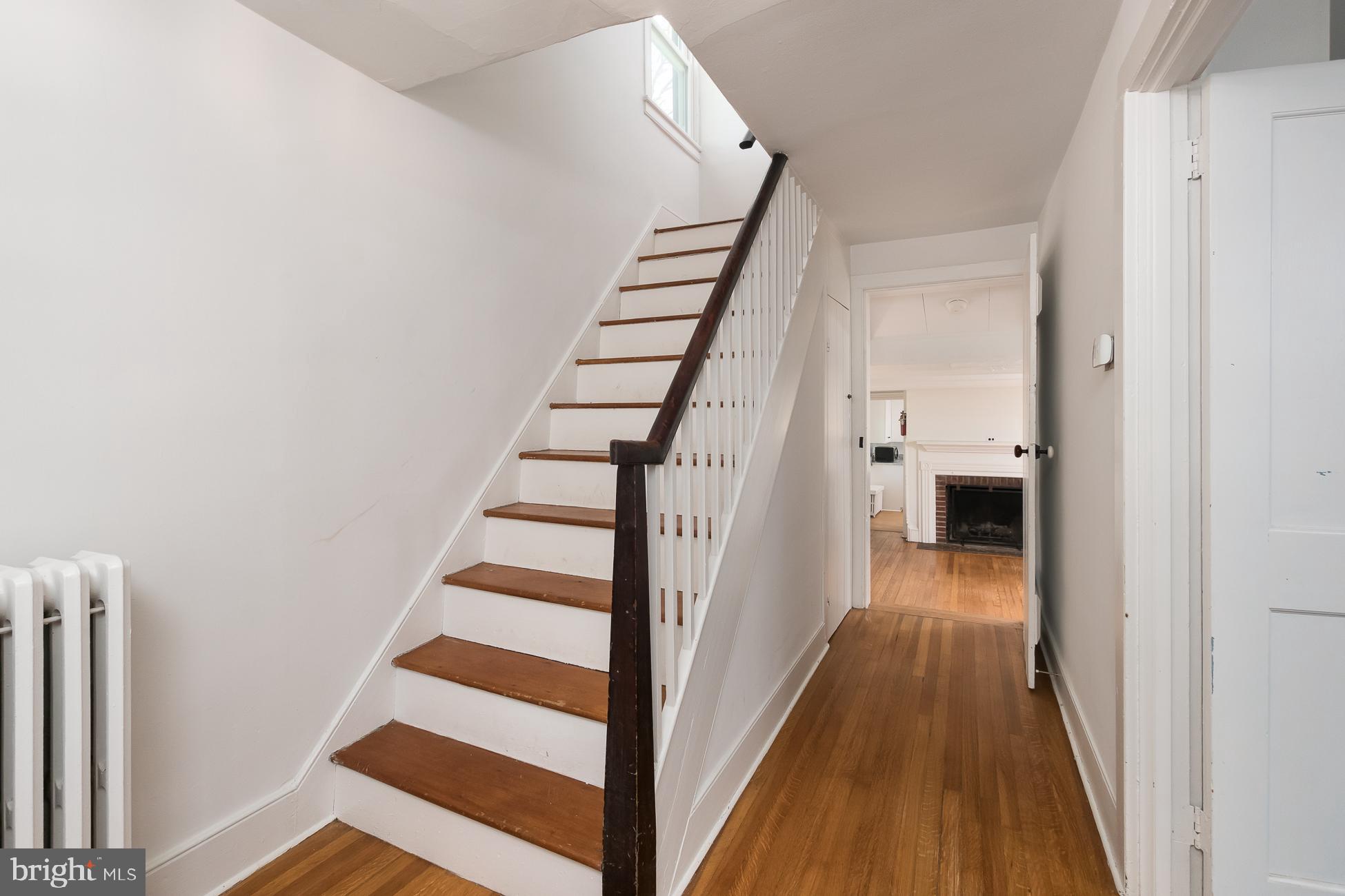 146 Carter Road Princeton, NJ 08540 - Photo 17 of 39 a view of a hallway with wooden floor and entryway