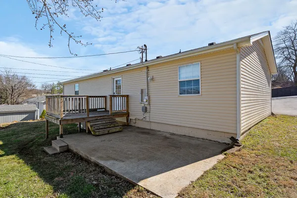 a view of backyard with deck