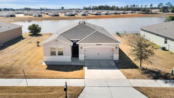 a view of a lake with a house