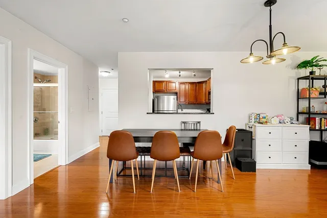 a view of kitchen and dining room with furniture