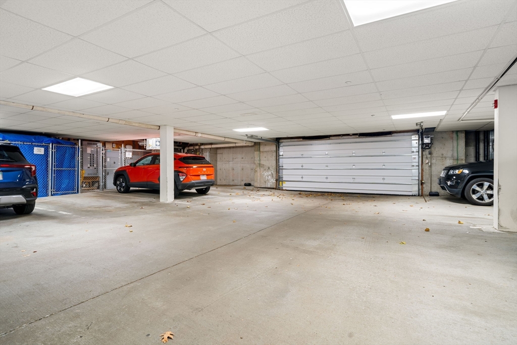 11 Cheriton Road, Unit 102 Boston, MA 02132 - Photo 30 of 42 a living room with furniture and a gym machine