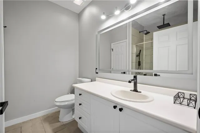 a bathroom with a sink and a toilet