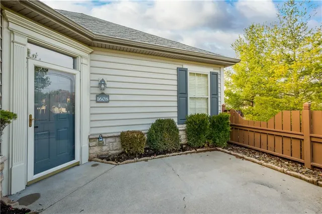 a view of a house with a street