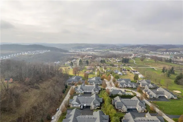 an aerial view of a city with lots of residential buildings