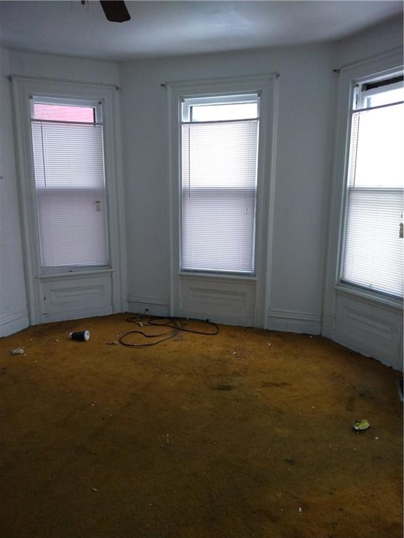 1005 Sheffield Street Pittsburgh, PA 15233 - Photo 13 of 25 an empty room with a window