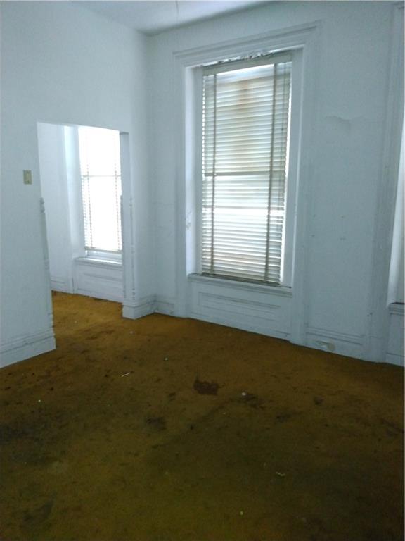 1005 Sheffield Street Pittsburgh, PA 15233 - Photo 18 of 25 an empty room with a window