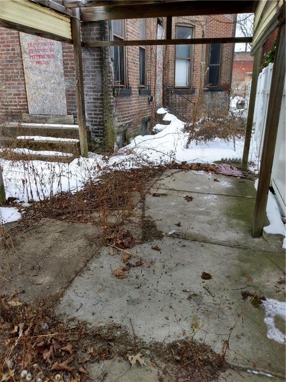 1005 Sheffield Street Pittsburgh, PA 15233 - Photo 25 of 25 a view of a house with a yard