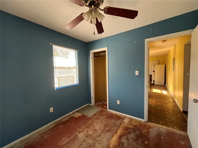 a bathroom with a shower and a mirror