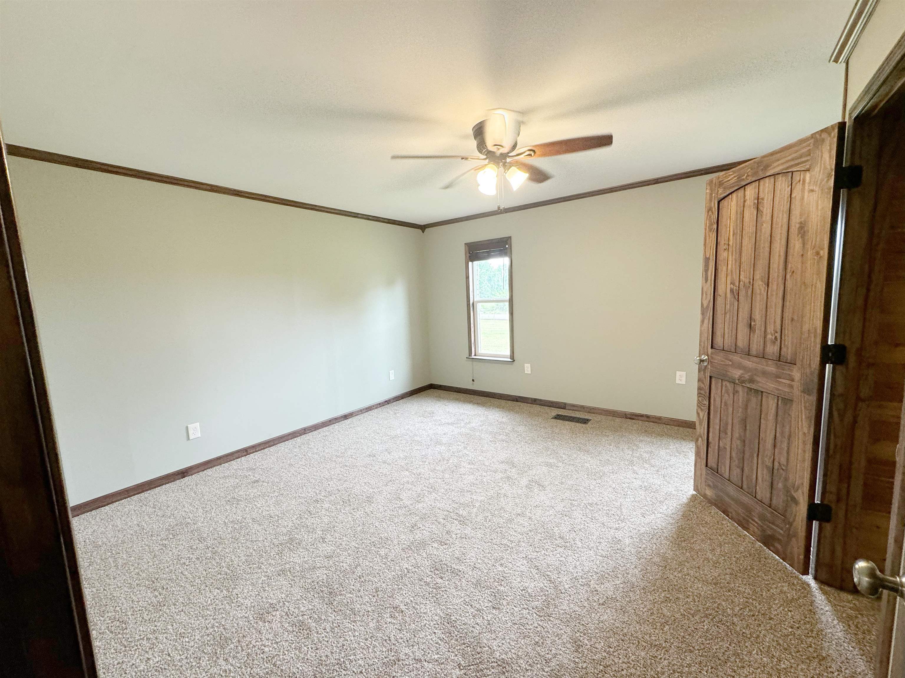 951 Sloan Road Burlison, TN 38015 - Photo 18 of 29 an empty room with windows and closet