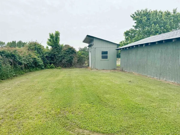 a view of outdoor space and yard