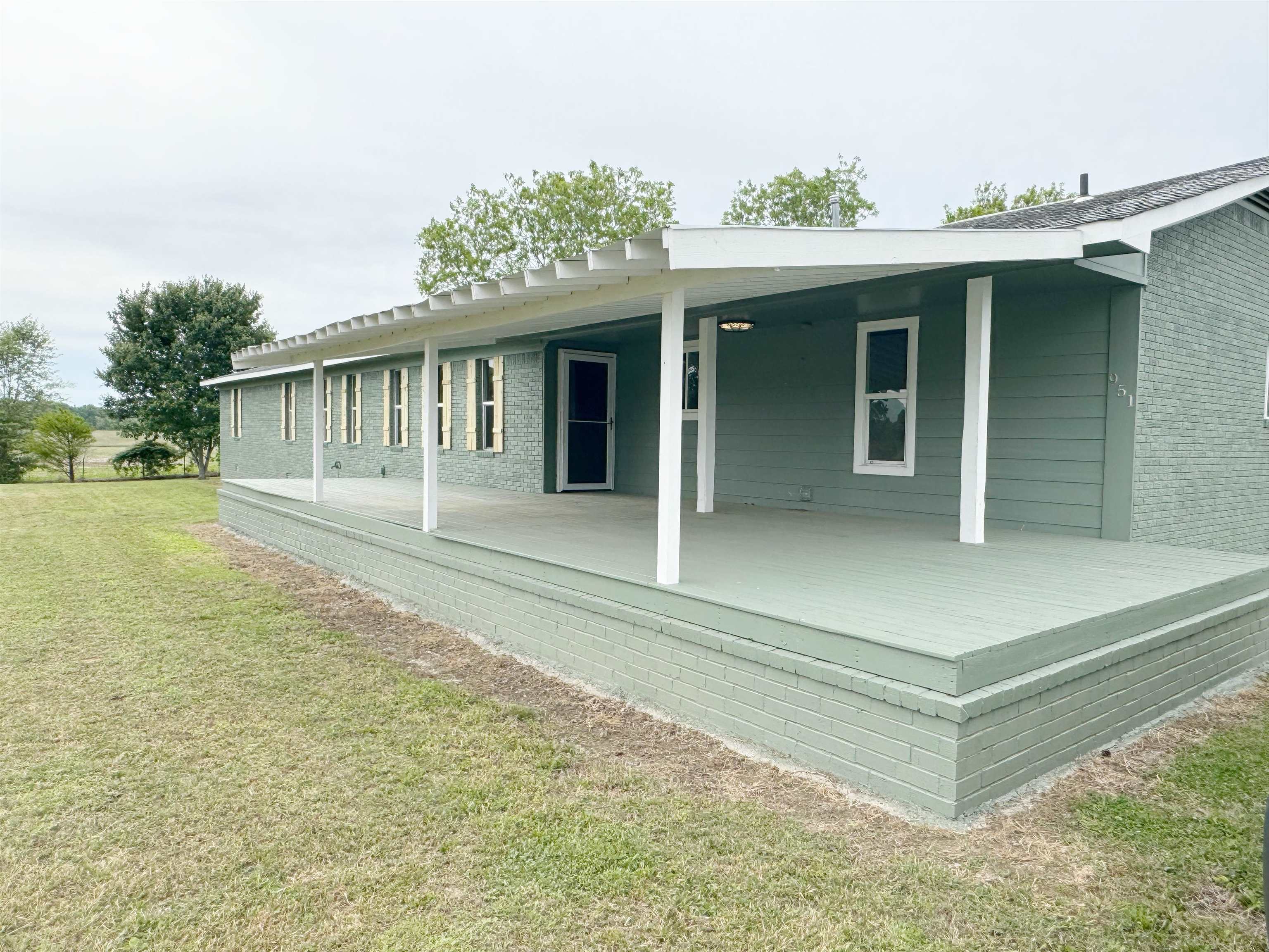 951 Sloan Road Burlison, TN 38015 - Photo 27 of 29 a front view of a house with a porch