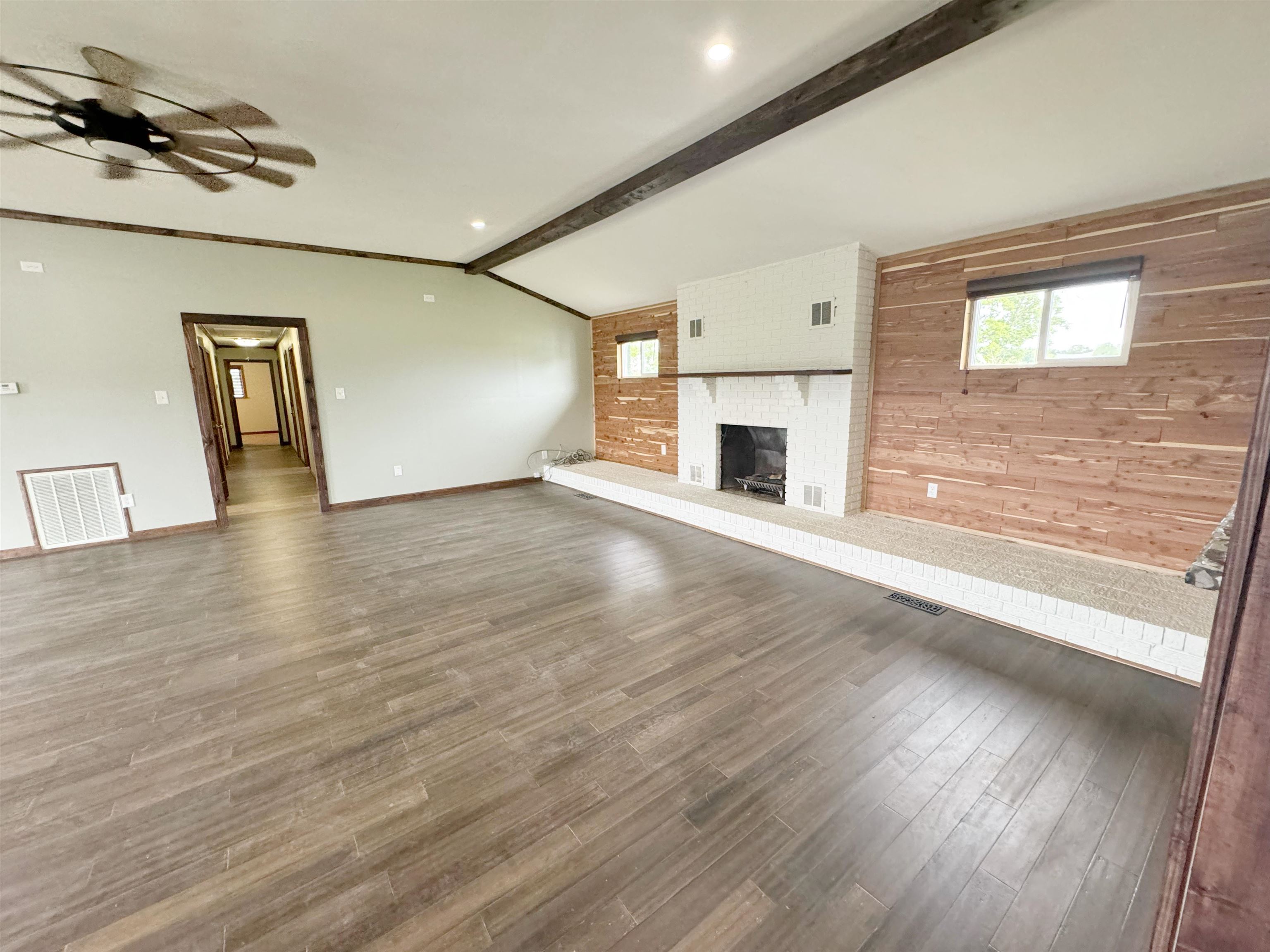 951 Sloan Road Burlison, TN 38015 - Photo 6 of 29 a view of a livingroom with wooden floor