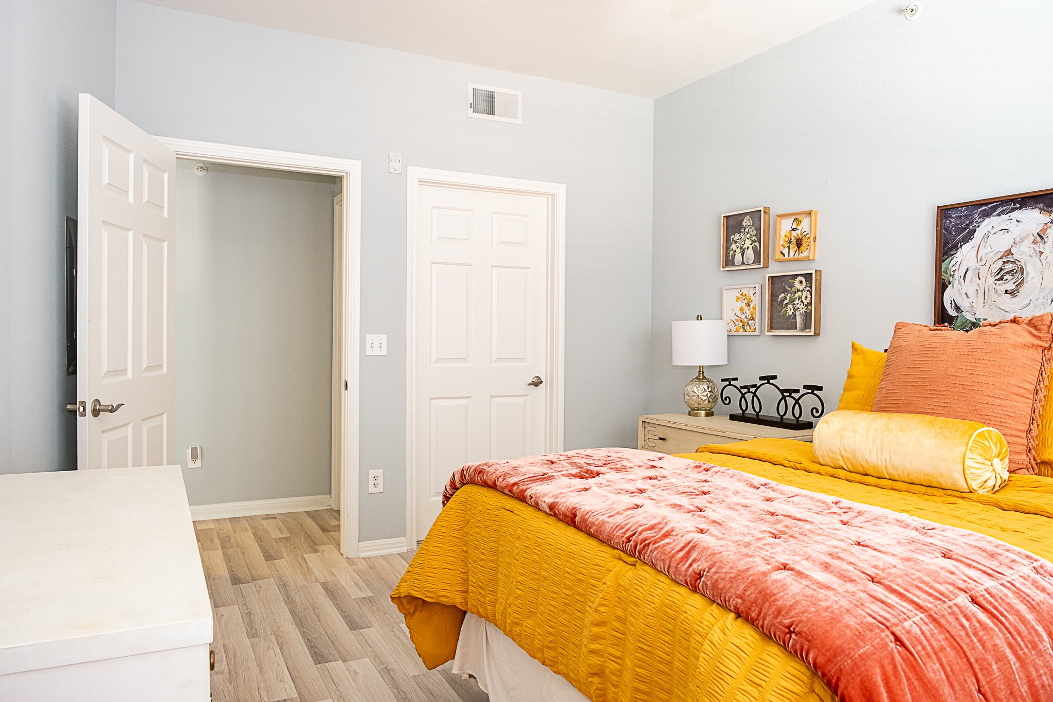 2502 Leon Street, Unit 309 Austin, TX 78705 - Photo 11 of 19 a bedroom with a bed and a couch