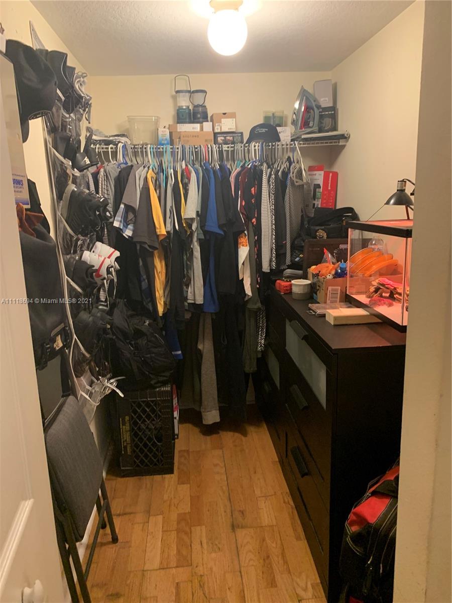 3770 North Jog Road, Unit 103 West Palm Beach, FL 33411 - Photo 10 of 15 a close view of walk in closet