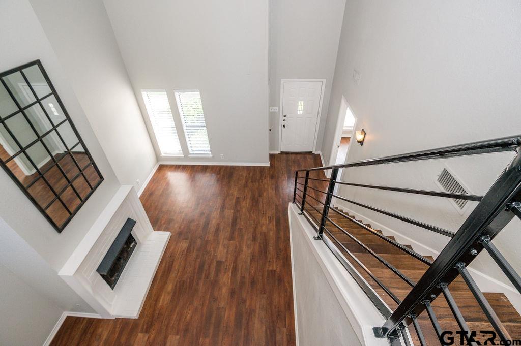 5809 Hollytree Drive Tyler, TX 75703 - Photo 14 of 32 a view of an entryway with wooden floor