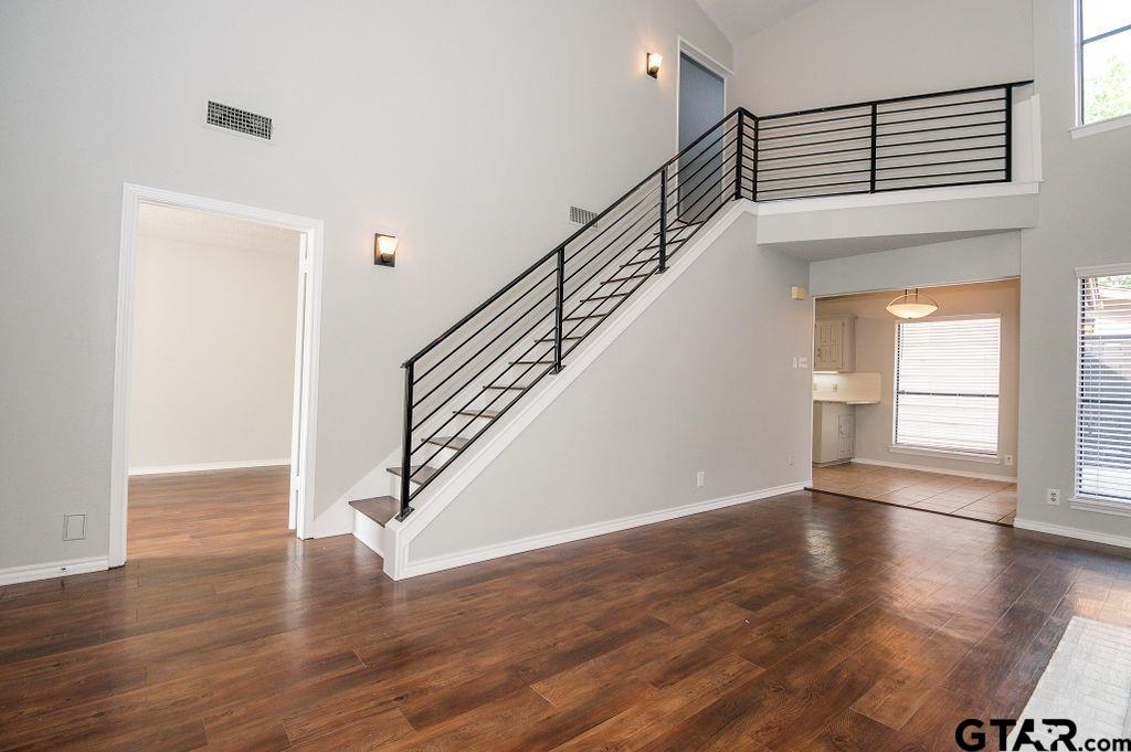 5809 Hollytree Drive Tyler, TX 75703 - Photo 3 of 32 a view of entryway with wooden floor