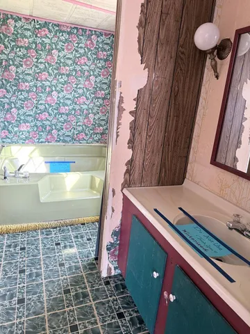 a view of a fireplace with wooden floor