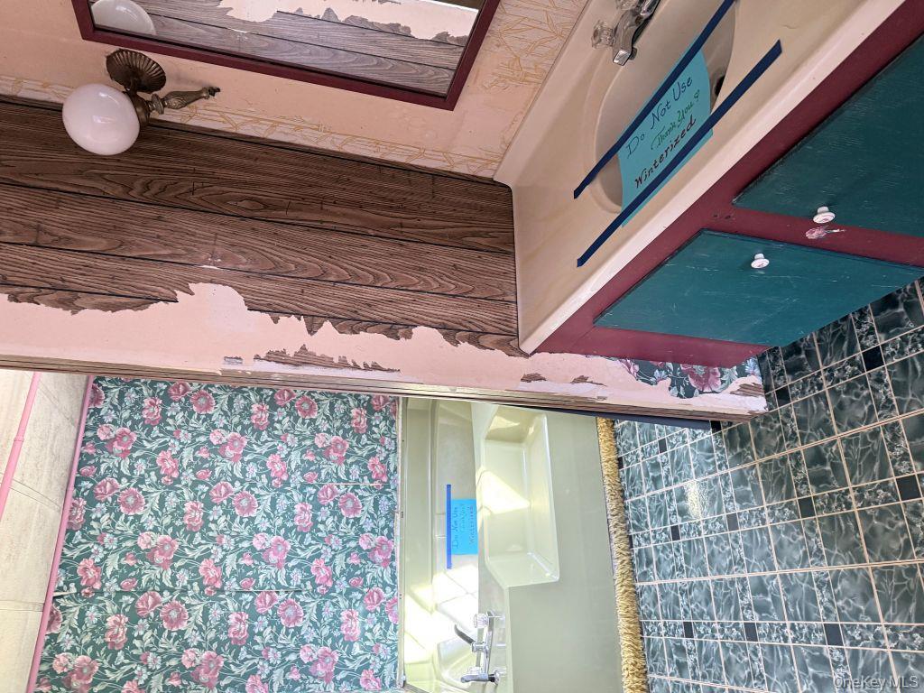 23 Clearview Road Wingdale, NY 12594 - Photo 17 of 21 a view of a fireplace with wooden floor