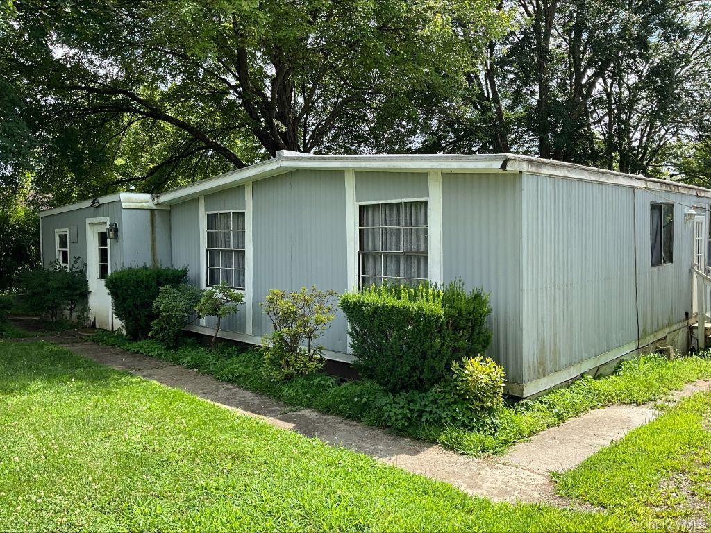 23 Clearview Road Wingdale, NY 12594 - Photo 4 of 21 a view of a house with a yard