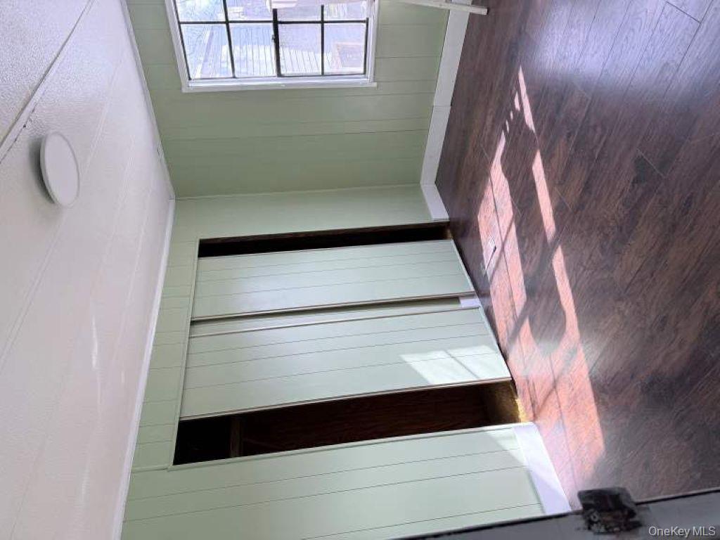 23 Clearview Road Wingdale, NY 12594 - Photo 8 of 21 a view of a room with wooden floor and windows