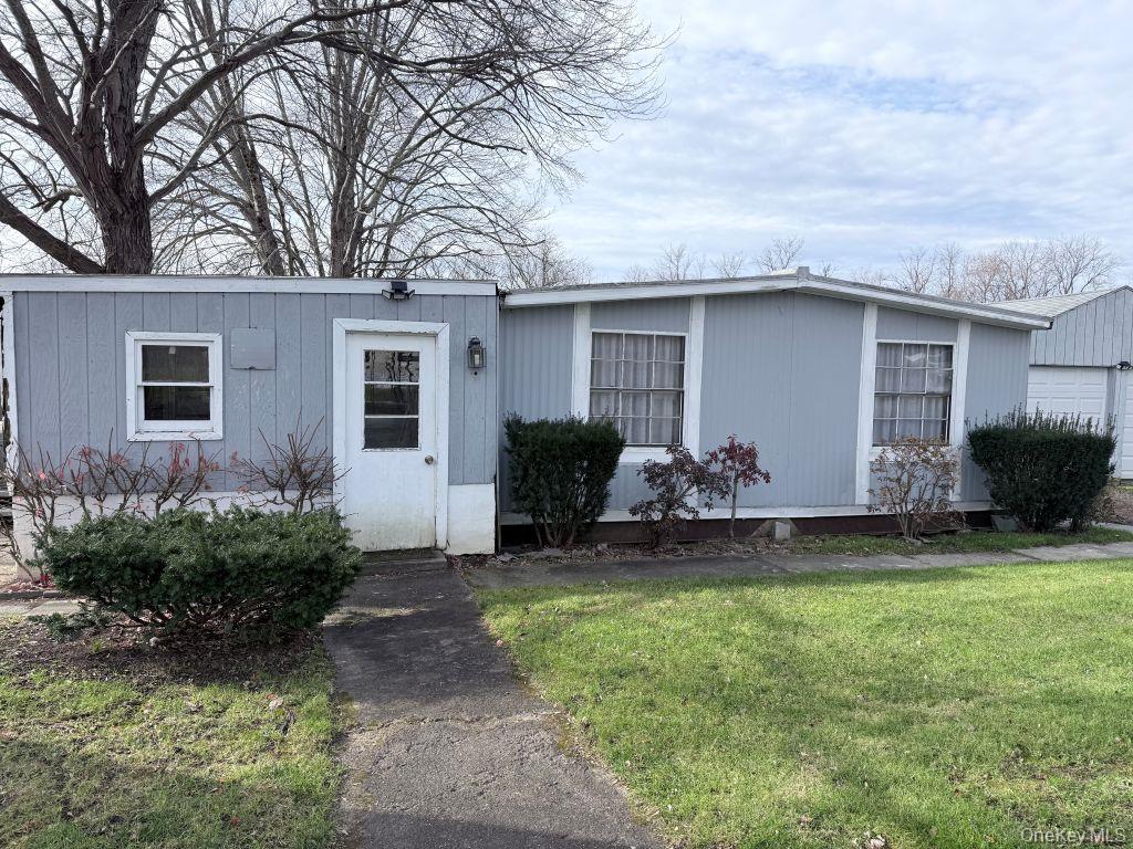23 Clearview Road Wingdale, NY 12594 - Photo 10 of 21 a front view of house with yard and green space