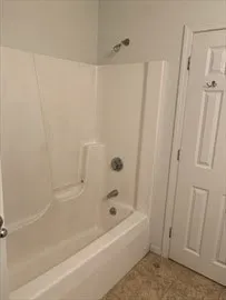 a bathroom with a bathtub