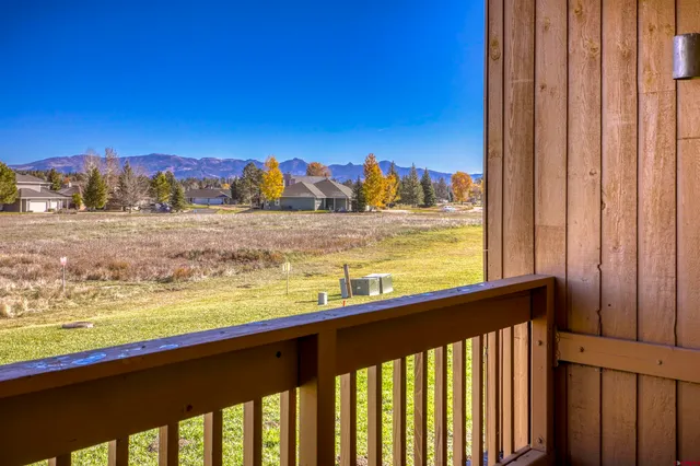 a view of a ocean from a balcony