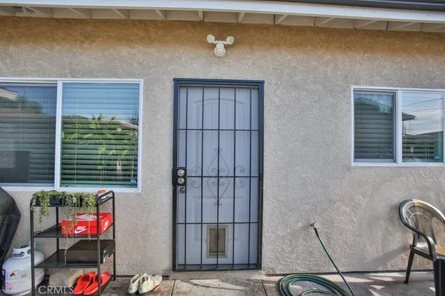 a backyard of a house with seating space