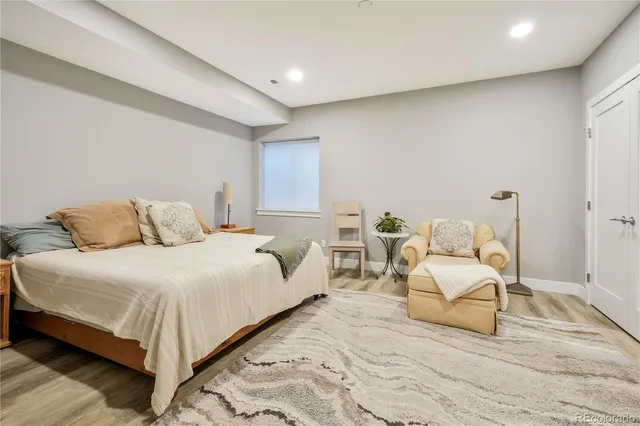 a kitchen with counter top space a sink cabinets and appliances