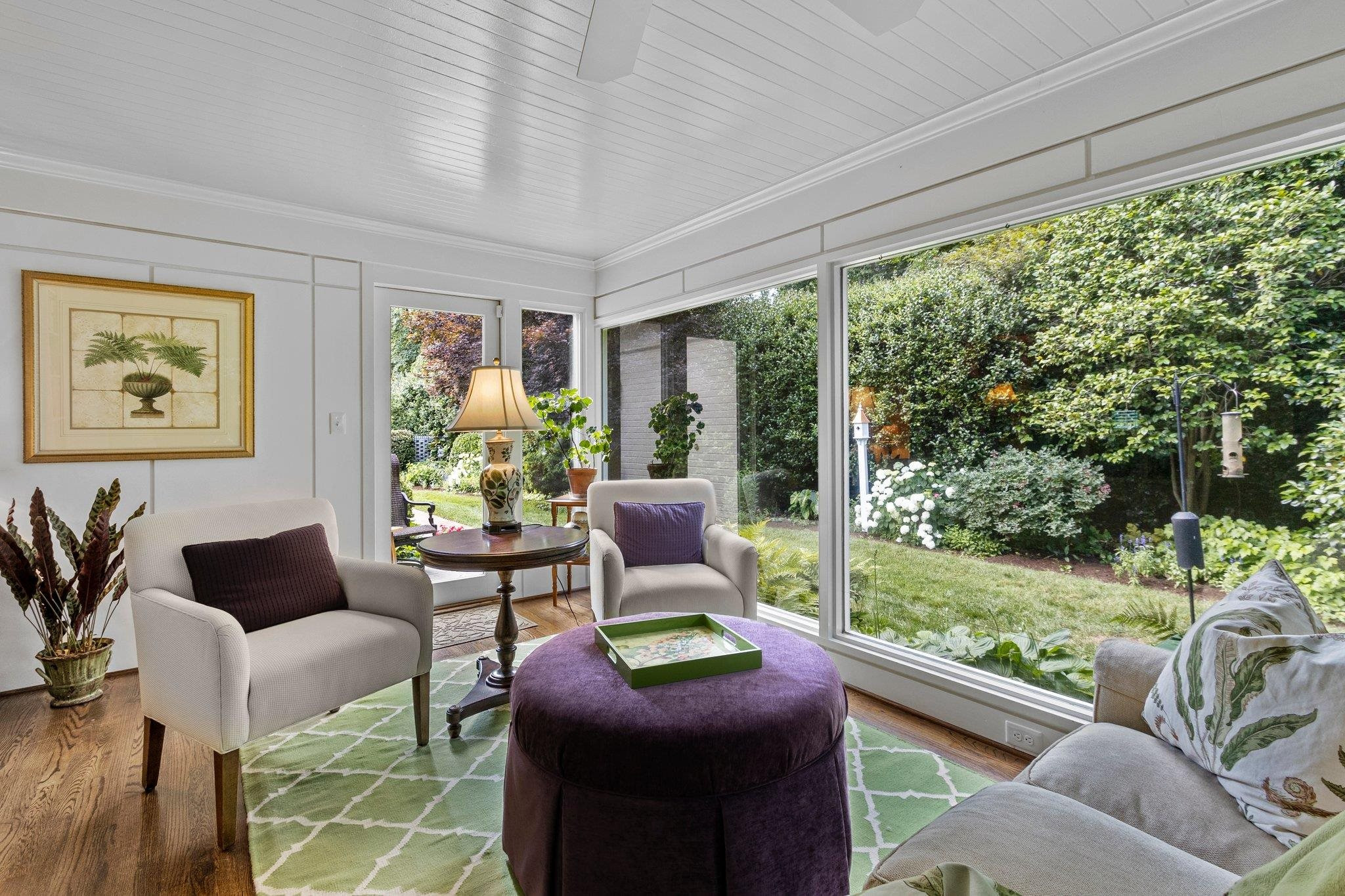 2217 St Marys Street Raleigh, NC 27608 - Photo 23 of 52 Breath taking views from the sunroom, filled with full windows allowing natural light and overlooking the impressive plantings and mature hedges that cannot be reporduced in our lifetime. Sun Room