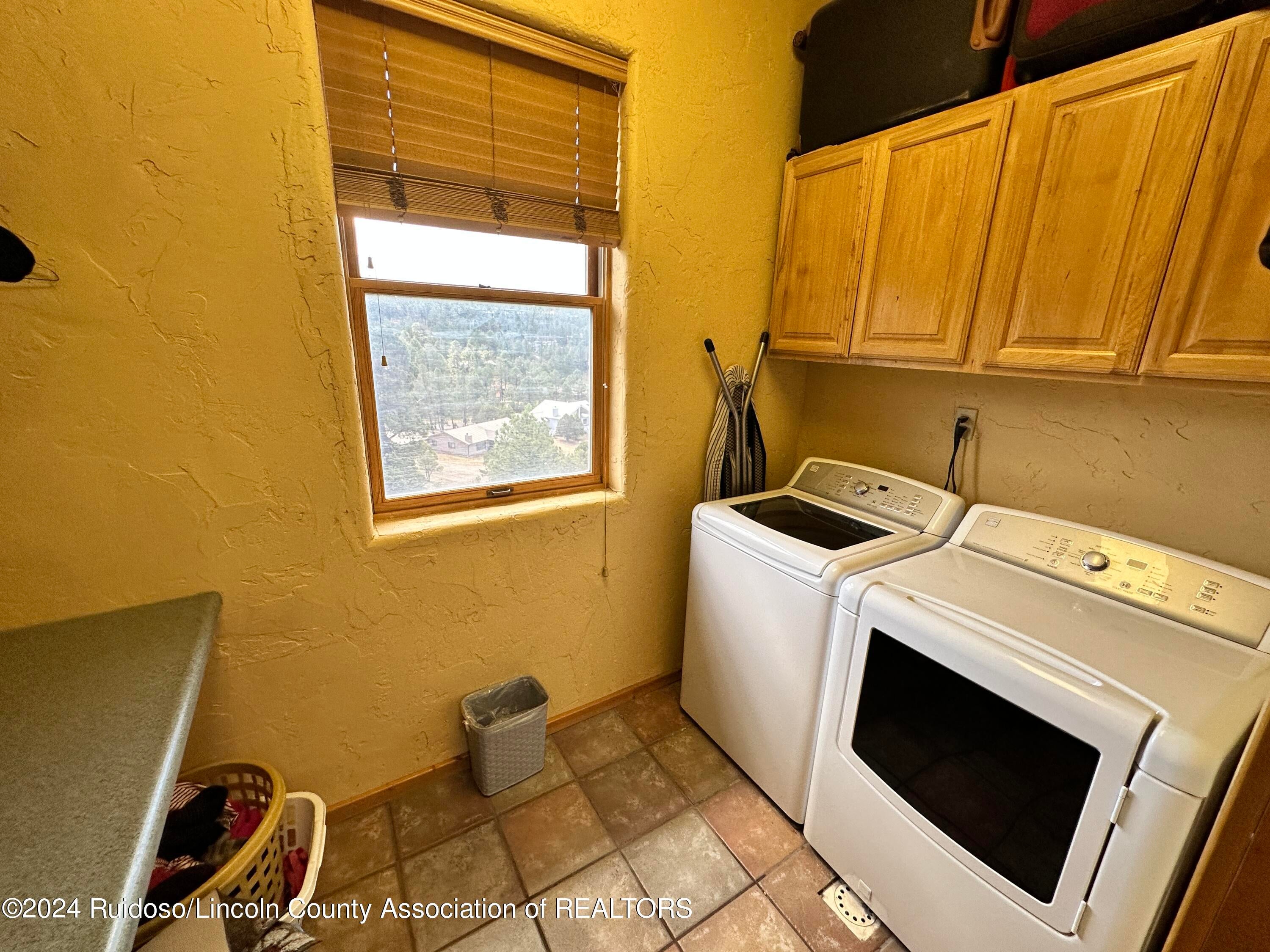 813 Hull Road Ruidoso, NM 88345 - Photo 31 of 59 PRIMARY BEDROOM UTILTY AREA