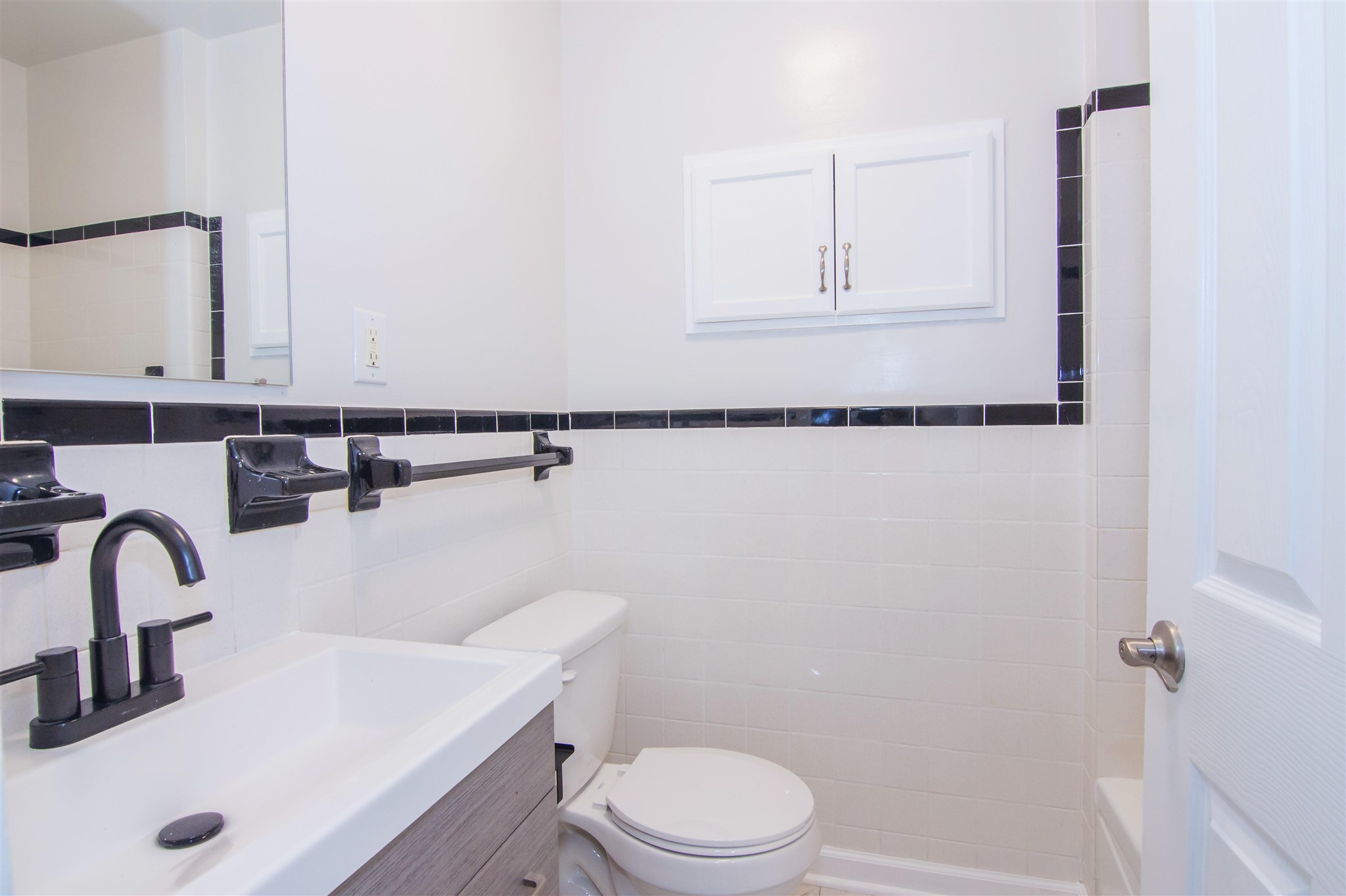 4133 Oak Ridge Road Mount Crawford, VA 22841 - Photo 17 of 30 a bathroom with a sink a toilet and mirror