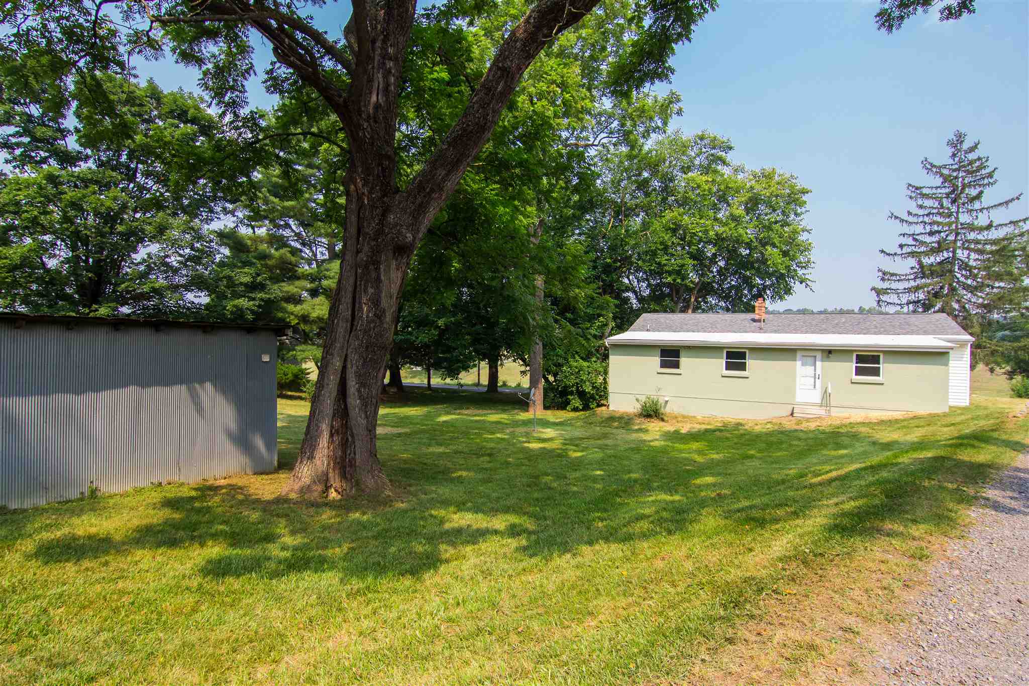 4133 Oak Ridge Road Mount Crawford, VA 22841 - Photo 3 of 30 a view of a yard in front of a house with large trees