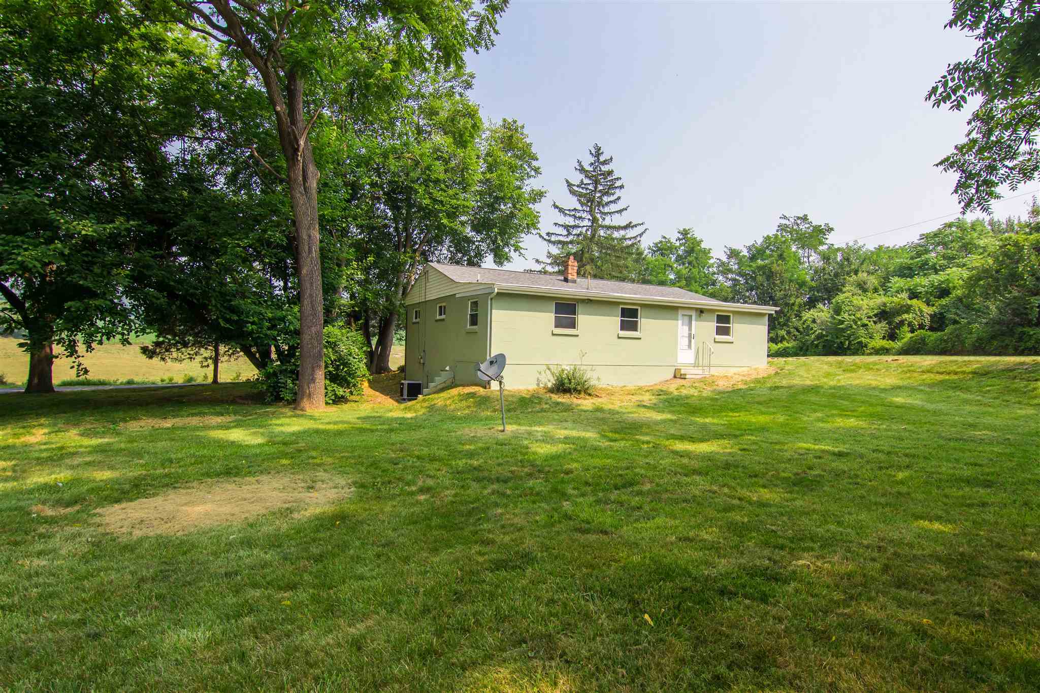 4133 Oak Ridge Road Mount Crawford, VA 22841 - Photo 7 of 30 a view of a house with a backyard